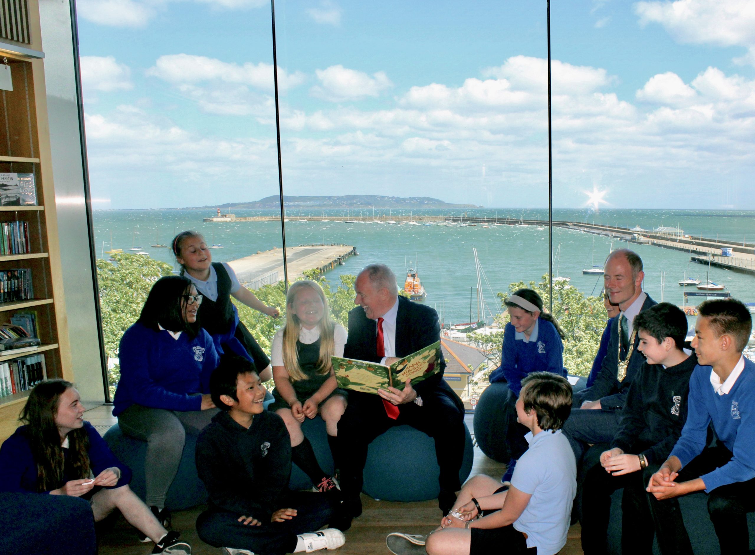 Minister Ring reads to children in DLR LexIcon
